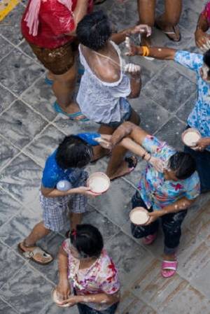 Daubing of White Chalk Paste at Thai Songkran Festival